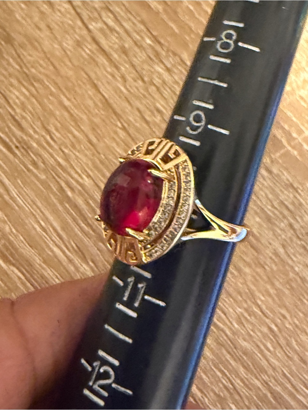 Gold Ring with Deep Red Cabochon and Pavé Accents